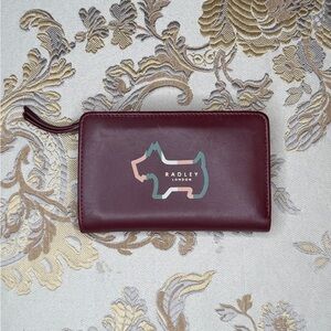 RADLEY LONDON Burgundy with pink green and white accents  Wallet with Dog Logo